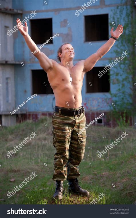 Naked Mercenary On Ruined Building Background库存照片 Shutterstock