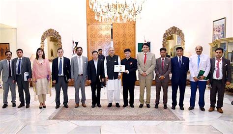 President Dr Arif Alvi In A Group Photo With A Delegation Of Tang