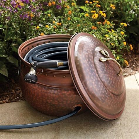 Build A Garden Hose Storage With Planter Diy Projects For Everyone