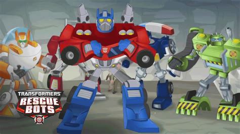 Playskool Heroes Transformers Rescue Bots Optimus Prime Dino Scans