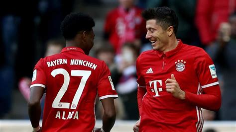 Bayern Munich 8 Hamburg 0: Lewandowski hits hat-trick in special day ...