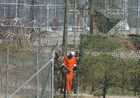 Scenes of a slow progression toward prison closure at Guantanamo