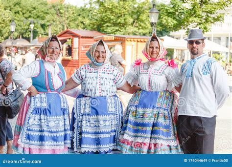 People Dressed In National Slovak And Eastern European Costumes Take