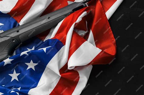 Premium Photo Automatic Rifle On Usa Flag On Wooden Background