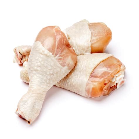 Premium Photo | Raw chicken legs on a white isolated