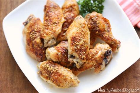 Crispy Skinned Parmesan Chicken Wings Are Baked With A Tasty Cheesy