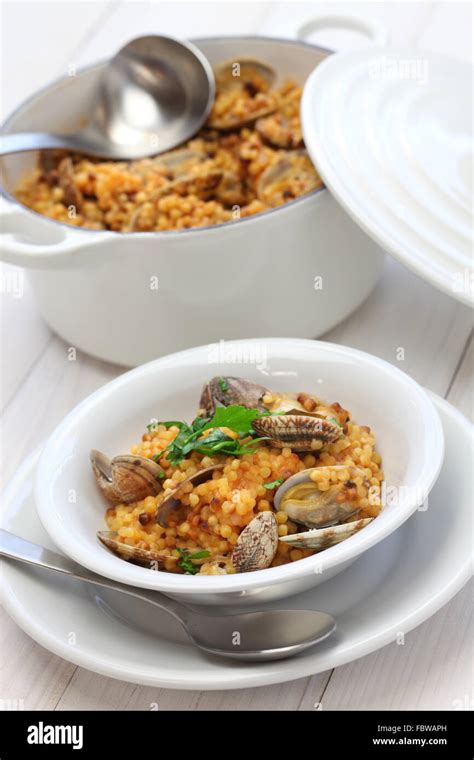 Sardinian Pasta With Clams Italian Cuisine Fregula Con Vongole