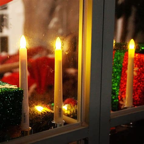 Amagic 9 velas de Navidad con temporizador velas cónicas sin llama con