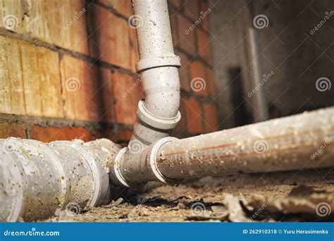 Sewer Pipes In Home Basement System Of Gray Sanitary Pipes When