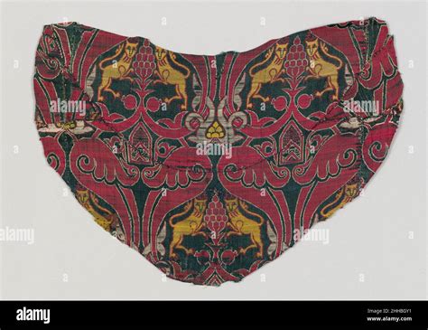 Textile Fragment 15th century This silk textile shows pairs of ...