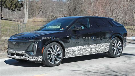 Cadillac Lyriq-V Spied In Black Hiding Aero Upgrades,…