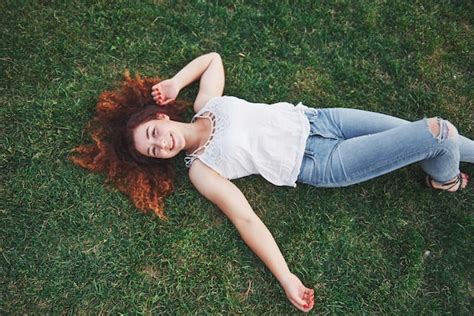 Girl Lying On Grass Images - Free Download on Freepik