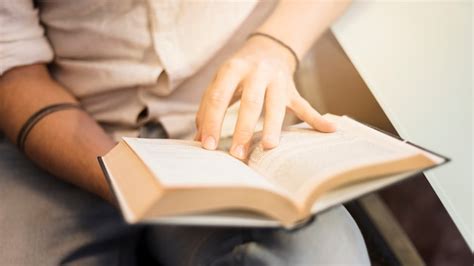 Free Photo | Modern man reading on couch