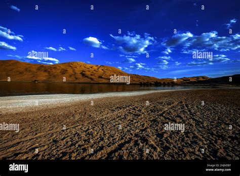 sand dunes   salt lake   badain jaran desert   mongolia