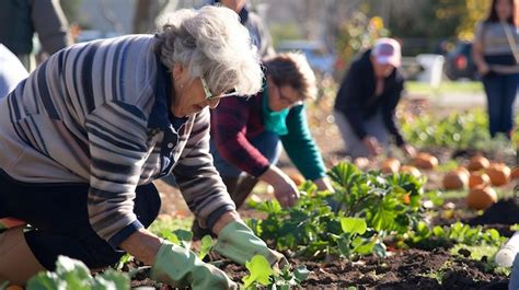 Premium Photo Group Of Elder Women Planting In A Backyard