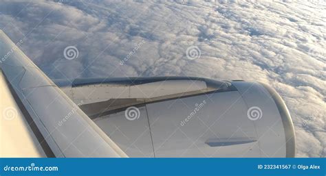 Flying Above the Clouds in an Airplane Stock Image - Image of white ...