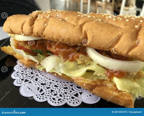 Chicken Baguette Sandwich Served on the Table Stock Photo - Image of ...