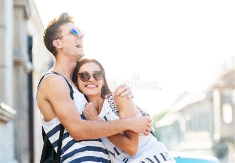 Cute Young Couple Hugging Outdoors Stock Image - Image of smile, women ...