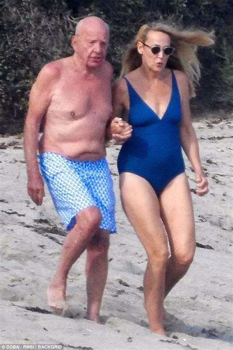 Jerry Hall Sports Plunging Blue Swimsuit With Rupert Murdoch In Malibu