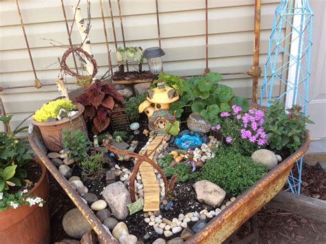 This Is My First Attempt At A Fairy Garden The Rusty Old Wheelbarrow Works Great Fairy