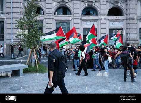 People With Palestinian Flags During The Demonstration In Naples In