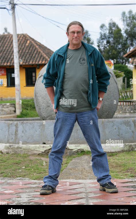 Man Standing Across The Equator Line At The Solar Culture Museum Near