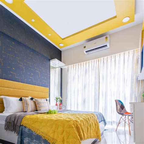 Bright False Ceiling Design With Inverted Cove Lighting Livspace