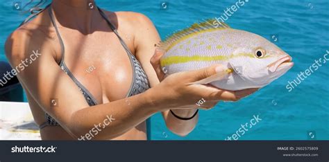 Woman Bikini Holds Fish While Fishing Stock Photo 2602575809 Shutterstock