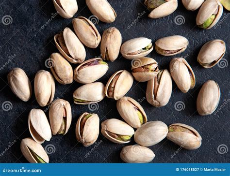 Roasted Pistachios Nuts On Dark Background Healthy Snack Stock Image