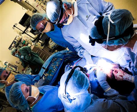 Photo | Doctors performing facial feminization surgery | UCLA