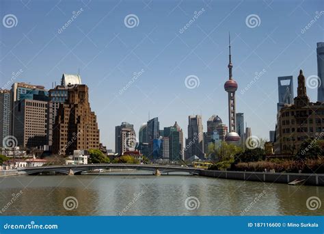 Wusong Suzhou River In Shanghai China With A Road Bridge And Bund