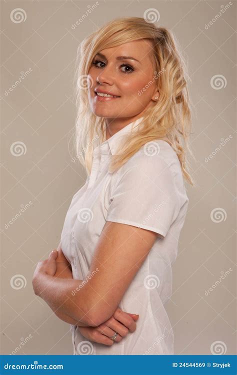 Portrait Of Beautiful Blonde With Arms Crossed Stock Image Image Of