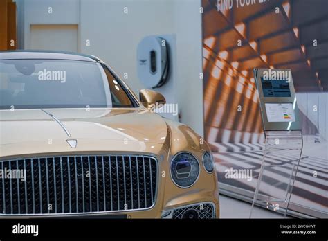 Gold Bentley Flying Spur Azure Hybrid Sustainable Energy Mulliner