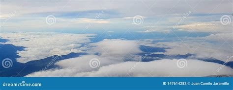 Sunny Sky With Some White Clouds Above The City Of Medellin Colombia