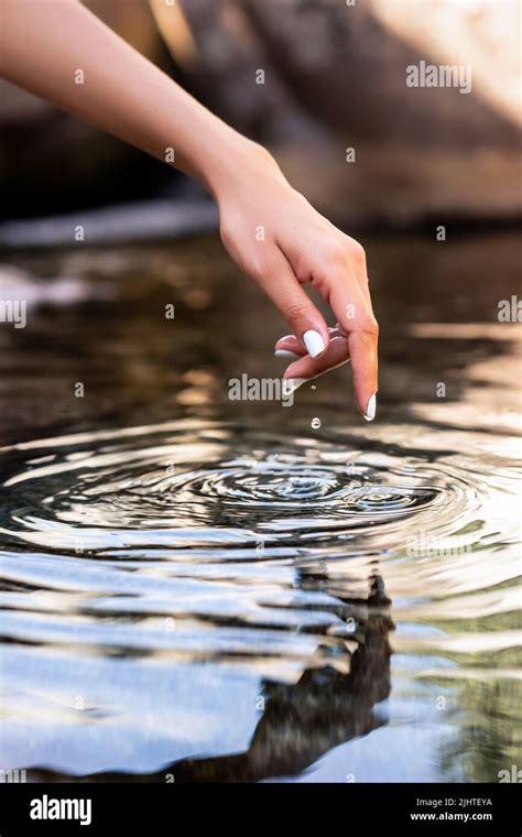 Finger Touching Water Surface Reflection Hi Res Stock Photography And