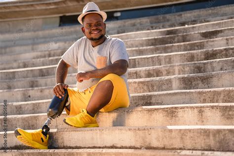 portrait of black man with prosthetic leg . Stock Photo | Adobe Stock