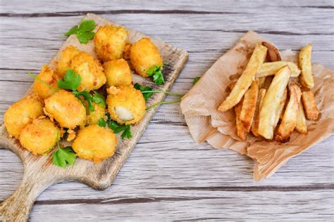 Fried Chicken Nuggets with Corn Flakes and French Fries Stock Photo ...