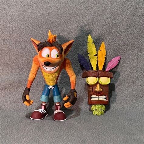 Neca Crash Bandicoot Deluxe With Aku Aku Hobbies Toys Toys Games