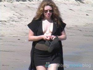 Natasha Lyonne Nude Tits Under The Dress While Walking Down The Beach