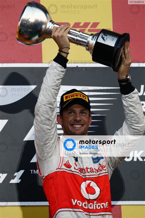 Race Winner Jenson Button Gbr Mclaren On The Podium Formula One