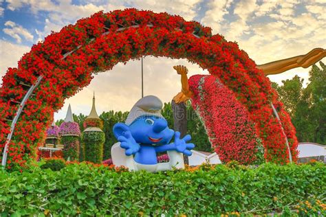 Smurf And Floating Lady In Dubai Miracle Garden Dubai Uae Editorial