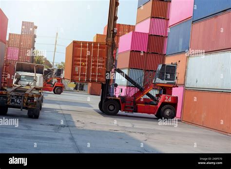 Container Industrial Crane Loading Containers In A Cargo Freight Ship