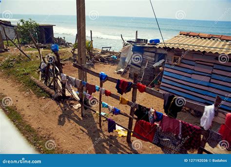 poor slums editorial photo image  bushes ocean