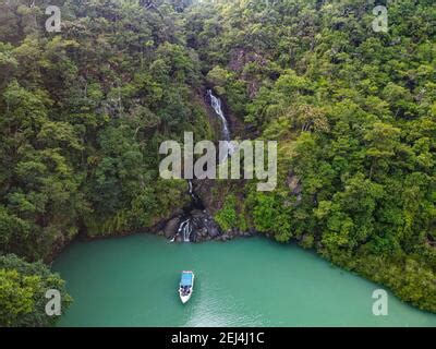 Aerial Of A Waterfall Dropping Right In The Ocean On Dome Island