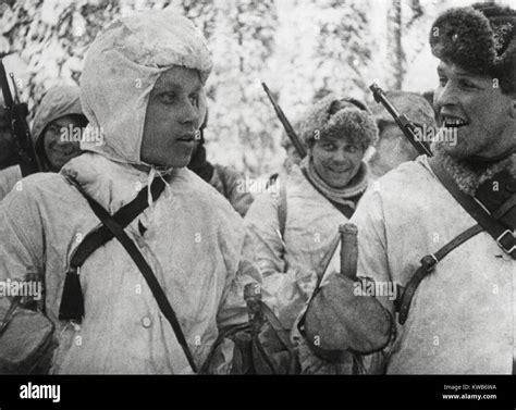 Finnish Soldiers in white uniforms that camouflage them against the ...