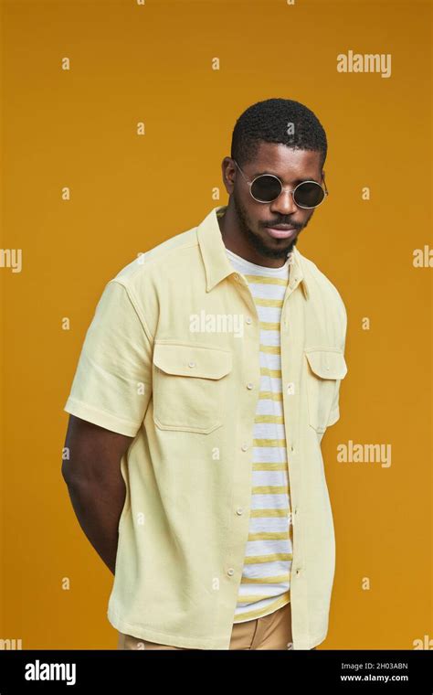 Vertical Waist Up Portrait Of Handsome African American Man Wearing