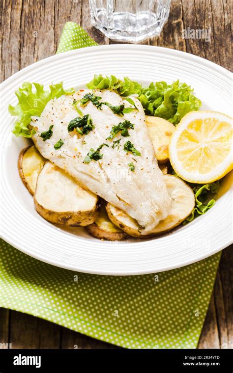 Baked cod fillet Stock Photo - Alamy