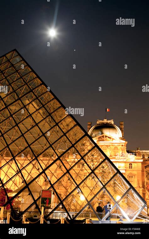 Louvre pyramid at night hi-res stock photography and images - Alamy