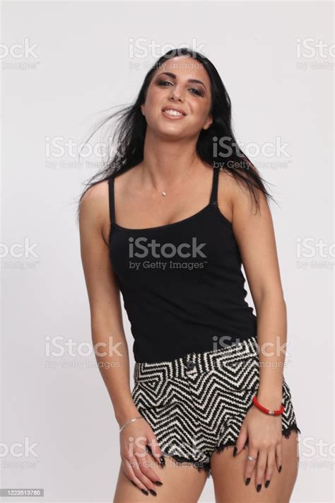 Beautiful Fancy Glamourous Caucasian Girl With Black Hair Posing In