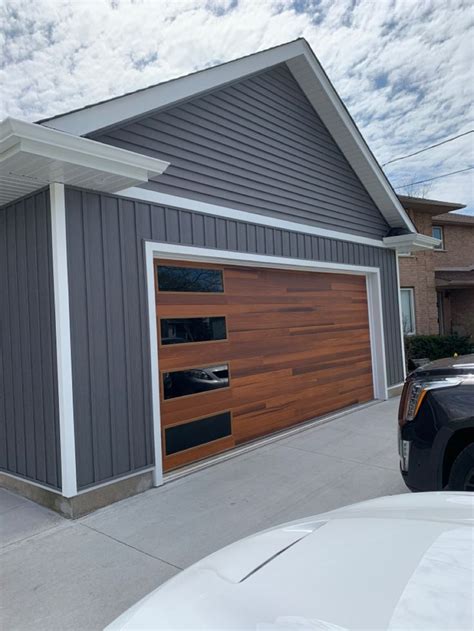 Artic Grey Siding With Cedar Plank Garage Door